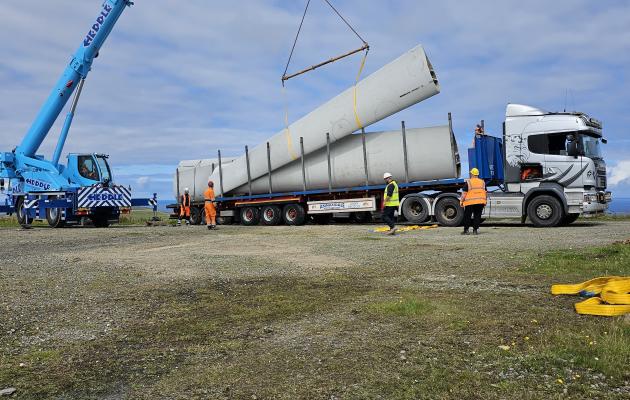 Turbine blade segments being loaded